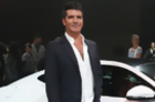 Simon Cowell Helps Promote New Jaguar