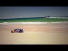 V8 Supercar vs. Airplane race on an Australian beach