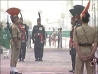 Indian soldier and Pakistan soldier facing each other at Wagah Border