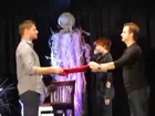 Supernatural Burcon 2013   Richard Speight presents Jensen Ackles with gym shorts